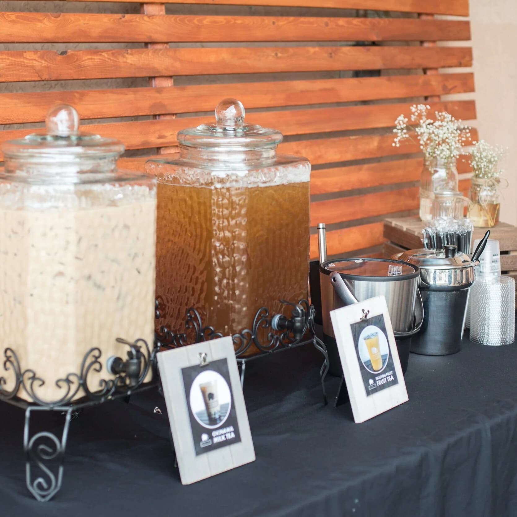 A drink bar set up with toppings and mix-ins